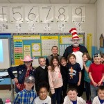 The Cat in the Hat posing with the second grade class.