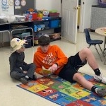All school read with Chase and Parker